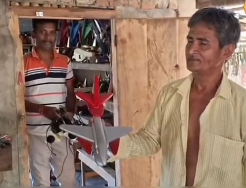 Image of the wooden toy maker of Cachar Mohammad Bakhtar Uddin Laskar