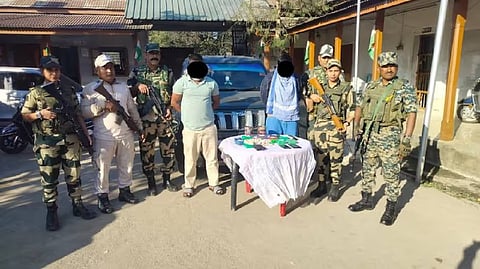 Image of the accused drug peddlers alongside the Manipur security forces