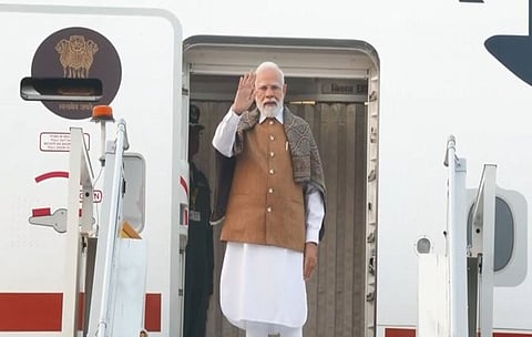Image of India's Prime Minister Narendra Modi before departing for South Africa