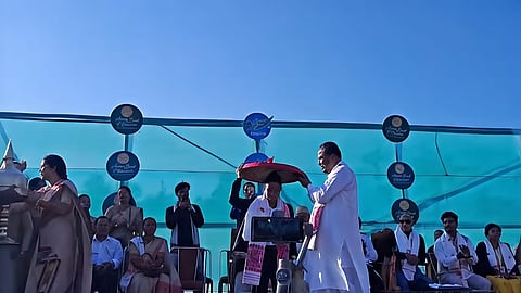 Image of Uma Chetry being felicitated by MLA Padma Hazarika