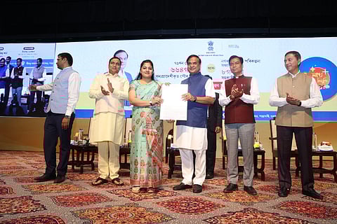 Image of the Assam CM Distributing appointment letters to the newly recruited personnel under the Housing & Urban Affairs Department