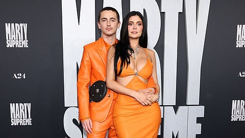 Kylie Jenner and Timothée Chalamet’s fiery orange looks light up the red carpet
