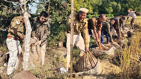 Image of the Jorhat Police confiscating the illicit liquor