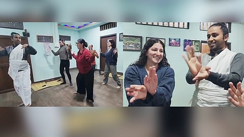 Image of Israeli tourists learning Sattriya dance in Majuli