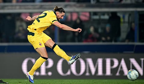 AC Milan beat Bologna to close gap on city rival Inter