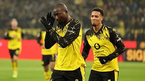 Borussia Dortmund tighten pressure in title race with win over Bayern