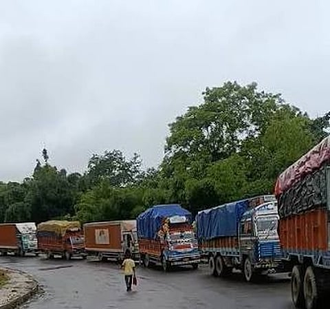 Goods-laden trucks
