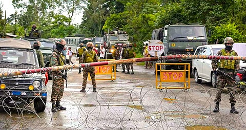 Militants ambush villagers collecting firewood; security forces use tear gas to disperse angry crowds in Imphal