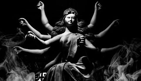 Rain-triggered chaos and false pavilion collapse rumors lead to a horrific tragedy at a North Kolkata pandal, claiming the lives of mostly women and children.