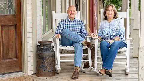 Dr. Phillip
Goad and his wife Starla
sit on a porch at the
Second Chance Youth
Ranch. The ranch is a
private placement agency,
providing a community
of homes for children
and teens in foster care.
