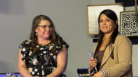 Hollie Reyes (right) tells her story while sitting next to her 100 Families Initiative advocate LaTosha Taylor.