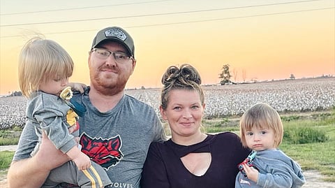 Steven, his wife, and their two boys.