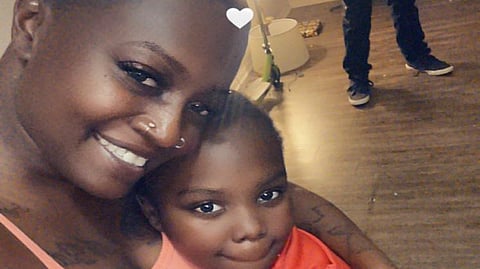 Anastasia Allen and one of her four children