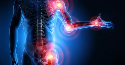 An illustration of a human body and the skeletal system. The hip, shoulder, elbow, and wrist are glowing red.