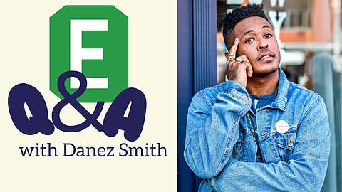 Promotional graphic for a Q&A featuring Danez Smith. The left side shows a large green South Seattle Emerald "E" logo with "Q&A" in bold blue letters below, followed by the text "with Danez Smith." On the right, Danez Smith poses thoughtfully, wearing a denim jacket and several rings, standing against a background of a city street.