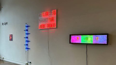 Several light-based pieces illuminate the gallery walls at Columbia City Gallery in the Tommy Gregory-curated "By Light" exhibition.