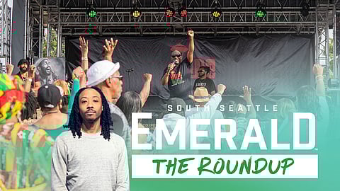 K. Wyking Garrett, president and CEO of Africatown Community Land Trust, encourages the crowd to support the community during a short speech.