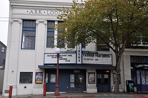 Street view of the Ark Lodge building in Seattle’s Columbia City neighborhood, now home to Tasveer Film Center, with marquee sign announcing a 2025 Mayor’s Award for outstanding achievement in film.