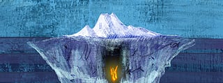 An illustration of an iceberg, visible from above and below the water, with a flame at its center.