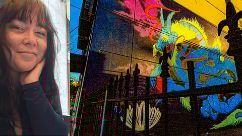 Collage of a person with long dark hair resting their chin on their hand beside a colorful dragon mural behind a black iron fence, combining a café selfie with vibrant street art.