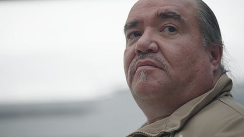Close-up of Chief Marchand Rice wearing a brown jacket.