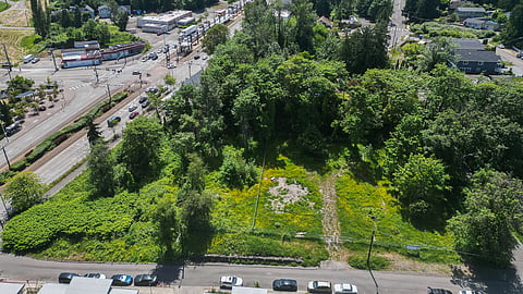 An aerial view shows an undeveloped lot near Rainier Beach Station in South Seattle.