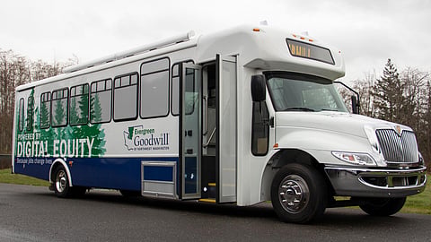 Digital Equity Bus in a parking lot.