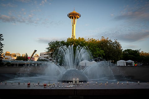 Candles in front of the International Fountain at Seattle Center.