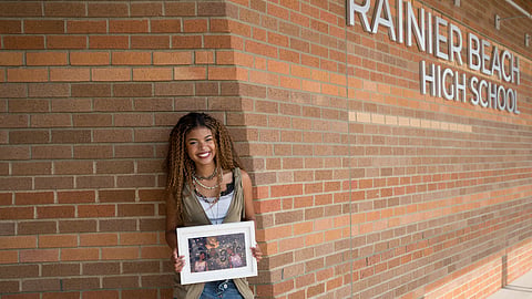Kameirah Johnson holds her winning Doodle for Google image outside of Rainier Beach High School.
