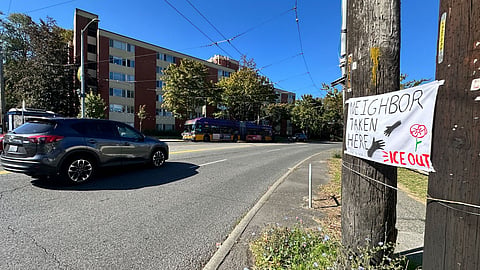 Handwritten sign reads "Neighbor taken here" and "ICE out."