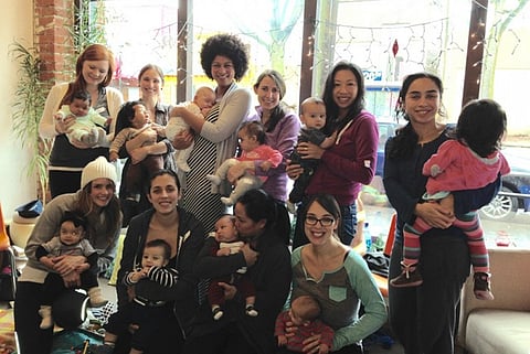 Mothers of newborns get together to build community and discuss multiracial parenting at Families of Color Seattle's (FOCS') Cornerstone Cafe inside the Hillman City Collaboratory. (Photo courtesy of FOCS)