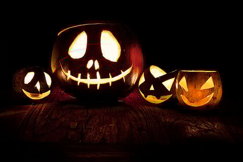 Twitter Photo Challenge #TwPhCh
Challenge #26: Halloween
Halloween is not a big phenomenon in Norway, but it's slowly getting bigger. The first image that popped into my mind when thinking of Halloween was of course Jack O' Lantern. I can see from the pool that I'm not the only one with that particular idea :-).
Here's Jack and his three kids. You can see that some of them are more mischievous than others. :-)
Technical details
Shot on a tripod in dark room with Toby's Canon 50mm f/1.4. Manual exposure, 15 seconds at f/13 and ISO 100. The pumpkins have tea candles inside. The outline of the pumpkins and red light comes from a red LED light I placed behind the large pumpkin. Very little post-processing was done on this, only slight cropping and recovery to get back some detail in the highlights.