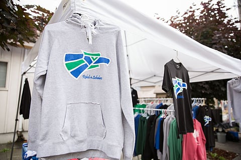 Threads of Solidarity: Duo's Clothing Line Embraces Rebels and Scholars