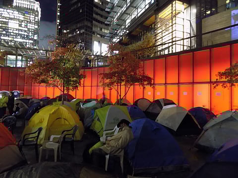 Protesters Occupy City Hall Overnight For Budget Hearing
