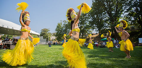 Te Fare O Tamatoa, a Tahitian dancing and drumming group, performs, during the Big Day of Play at the Rainier Playfield in Seattle, Washington, on Aug. 18, 2018. (Photo: Carolyn Bick)