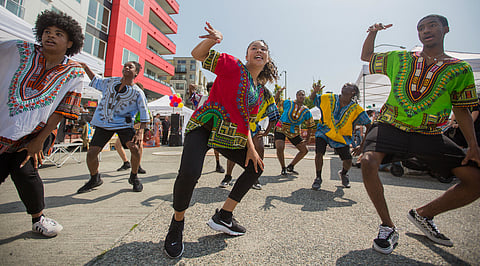 The Northwest Tap Connection performs, during the Othello Block Party in Seattle, Washington, on July 28, 2018. (Photo: Carolyn Bick)