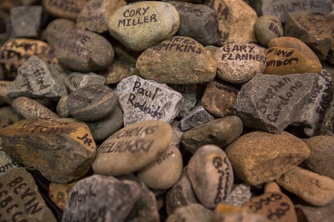 A pile of 1,000 stones sits on an ofrenda meant to commemorate homeless people who have died in Seattle at El Centro de la Raza in Seattle, Washington, on Nov. 1, 2018. (Photo: Carolyn Bick)