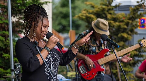 La Tanya Horace, left, performs as part of her group Sistas Rock the Arts, during the South End Heritage Festival in Seattle, Washington, on July 27, 2019. (Photo: Carolyn Bick)