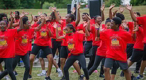 Teens with the Teen Summer Musical perform, during the Othello Park International Festival in Seattle, Washington, on Aug. 11, 2019. (Photo: Carolyn Bick)