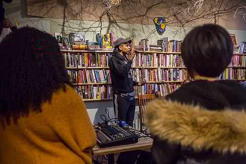 Jerell Davis speaks, during a Black Panther Party educational event at Estelita's Library in Seattle, Washington, on Nov. 16, 2019. (Photo: Carolyn Bick)