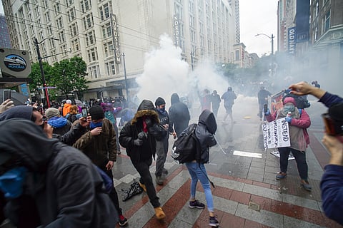 The Seattle Police Department let off flash grenades and sprayed pepper spray in an effort to disperse protester during a May 30, 2020, protest over the killing of George Floyd by the Minneapolis Police Department. (Photo: Susan Fried)