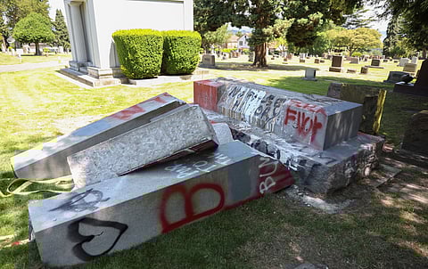 A once towering monument to Confederate soldiers in Seattle's Lake View Cemetery was reduced to pillars of rubble by local activists over the weekend. (Photo: Alex Garland)