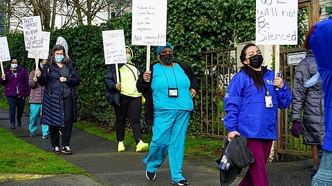 Medical personnel from Carolyn Downs Family Medical Center and Country Doctor Community Health Centers walked out of work on January 28, 2021, to express their disappointment in the reinstatement of Raleigh Watts as executive director. (Photo: Susan Fried)