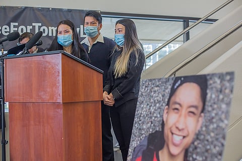 From left to right, Tommy Le's aunt, Uyen Le, father Hoai Le, and cousin Xuyen Le start to cry as they speak, during a press conference announcing the $5 million settlement with King County and King County Sheriff's Office Deputy Cesar Molina in the Queen Anne area of Seattle, Washington, on March 24, 2021. The Le family filed a civil suit against the County and Molina, after Molina shot and killed Tommy Le in Burien in 2017. Photo: Carolyn Bick