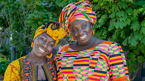 Adama Jammeh and Oumie Sallah, co-owners of Afella Jollof Catering. Photo by Denise Miller, courtesy of Global to Local.