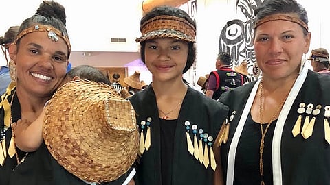 Rachel Heaton at the Canoe Journeys protocol with her son, daughter, and sister. Photo courtesy of Rachel Heaton.