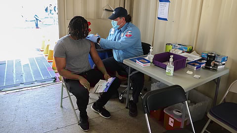 A patient receives a COVID-19 vaccination at a City of Seattle vaccine pop-up in Rainier Beach. (Photo: Alex Garland)