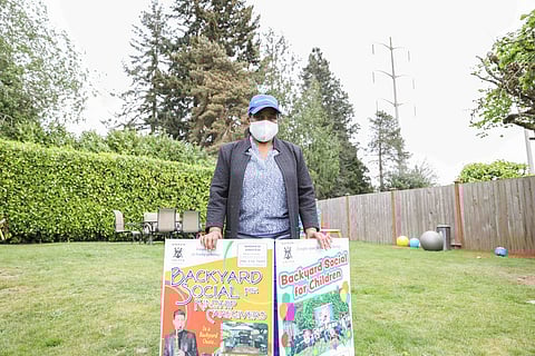 Photo of Alesia Cannady in the backyard of her Skyway home.