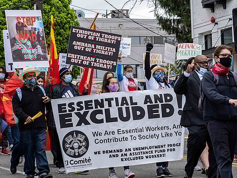 May Day protesters started their march at St. Mary's Church and made their way down Jackson Street towards the Chinatown-International District. (Photo: Ronnie Estoque)