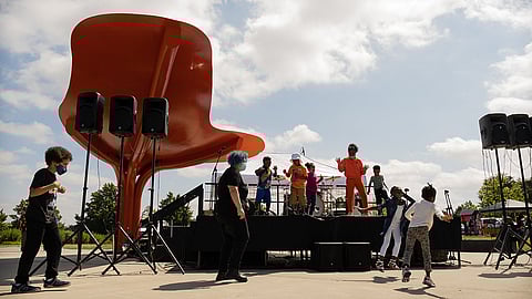 Black youth were celebrated and encouraged to express themselves throughout the programming for the Malcolm X Hip Hop Soul Rally. Children dance to lively music on and off stage at Jimi Hendrix Park. (Photo: Ronnie Estoque)